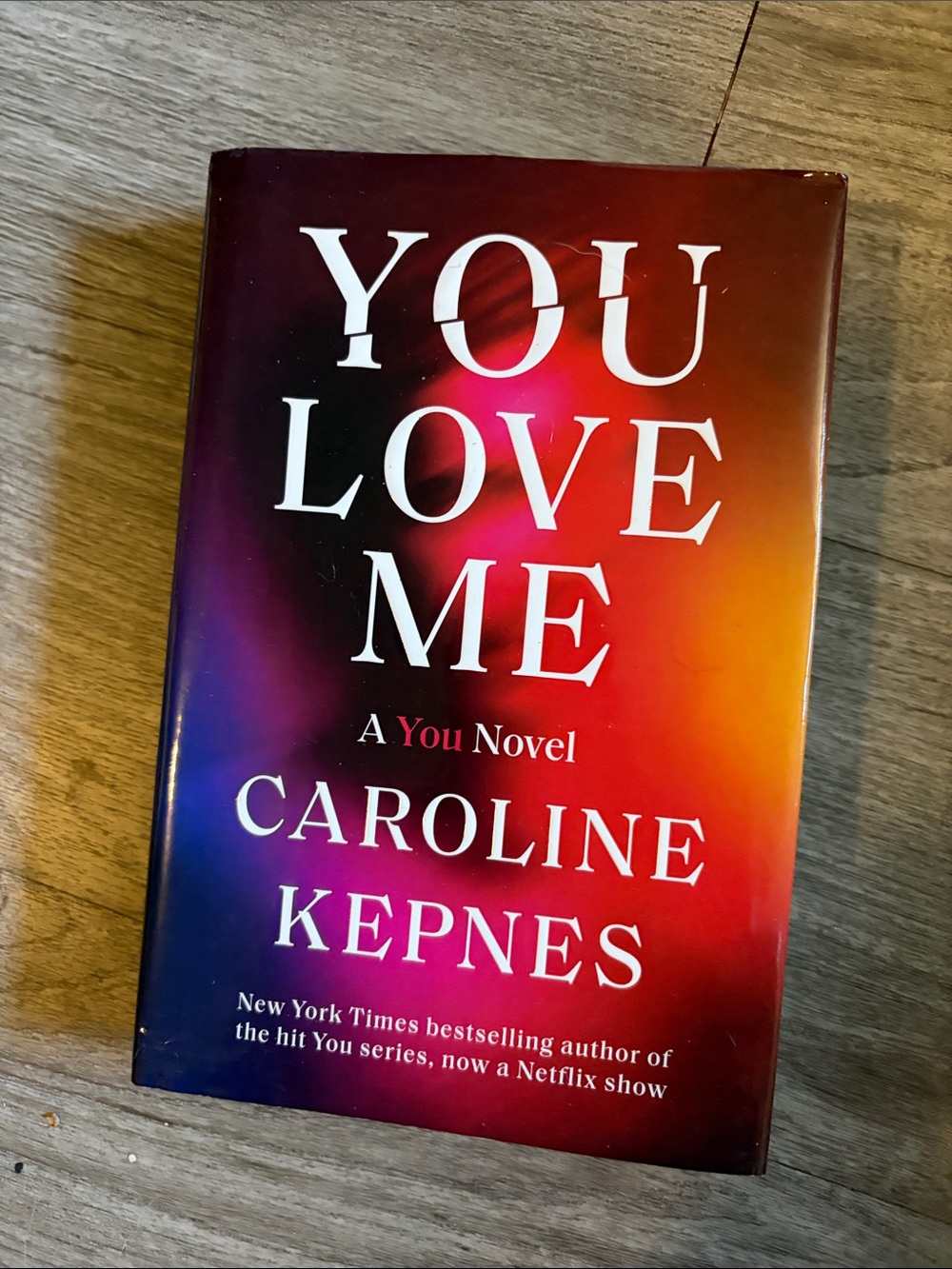 You Love Me by Caroline Kepnes - Vibrant Red/Orange/Purple Cover